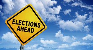 road sign reading "elections ahead"